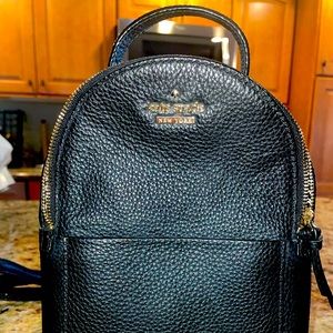Never before used Kate Spade mini backpack/purse